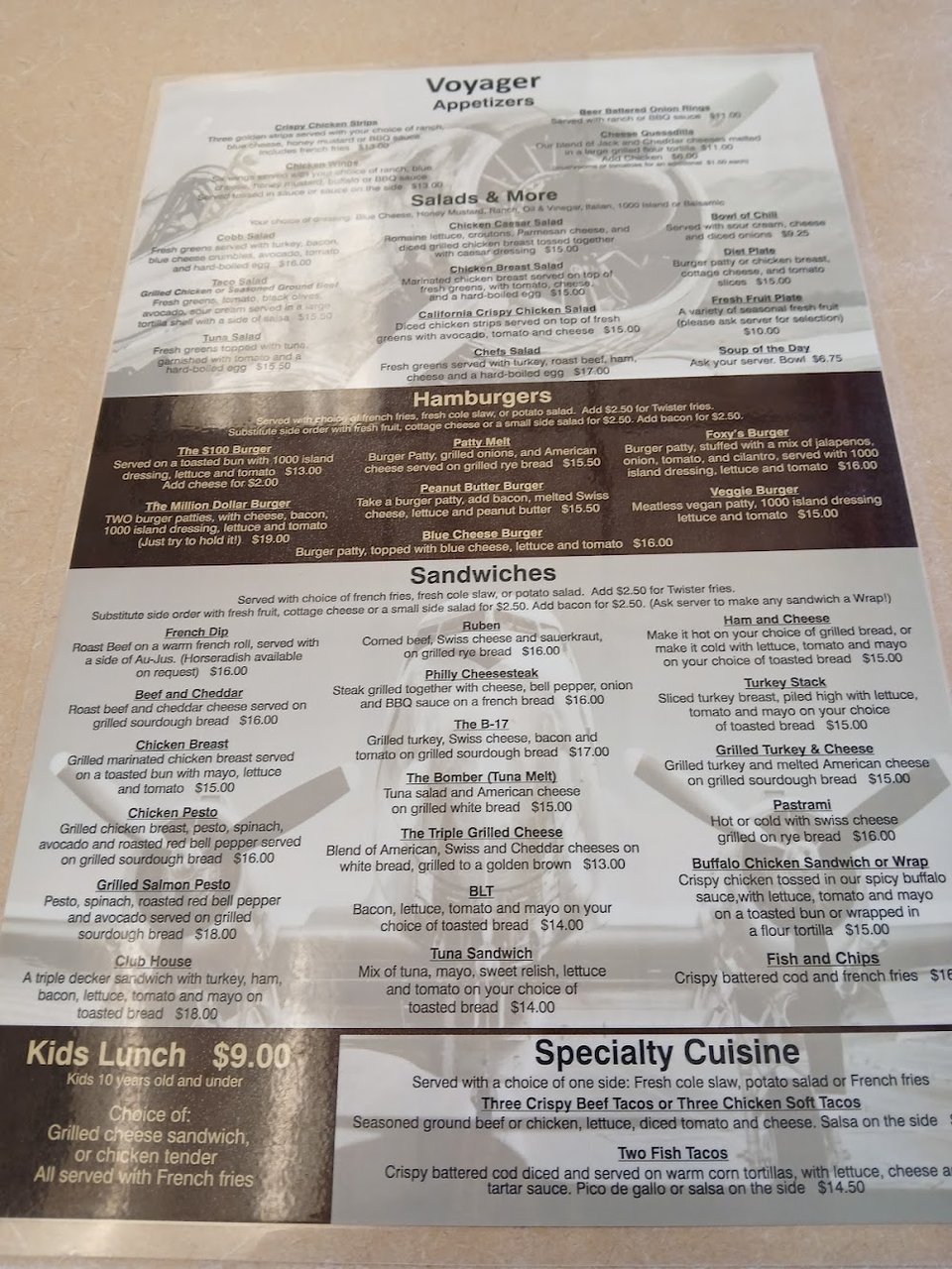 Menu page with burgers and sandwiches.